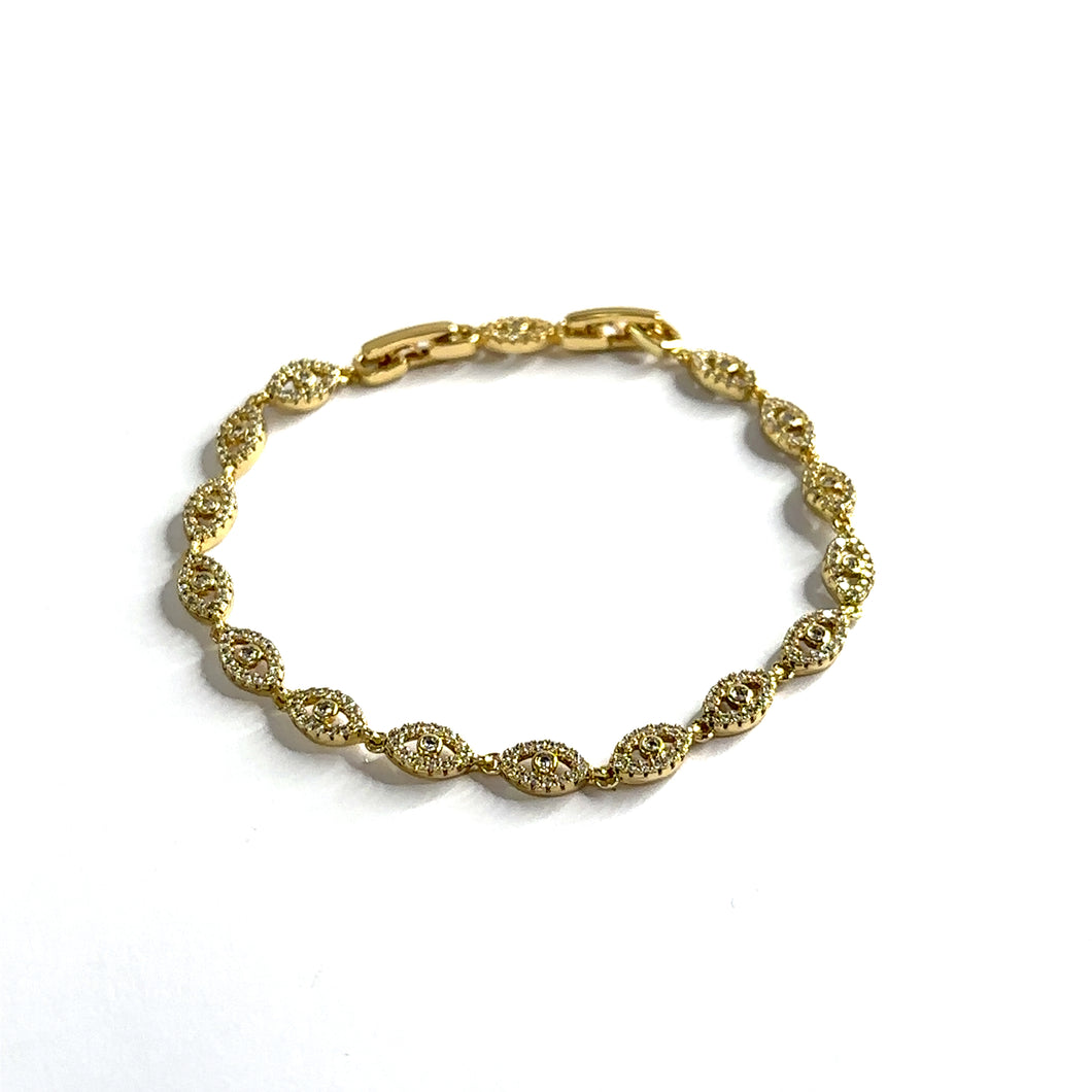 Pulsera de ojitos dorados