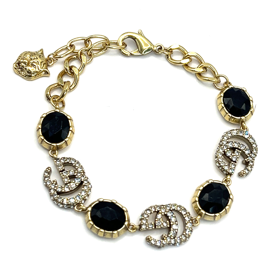 Pulsera GG con piedra negra