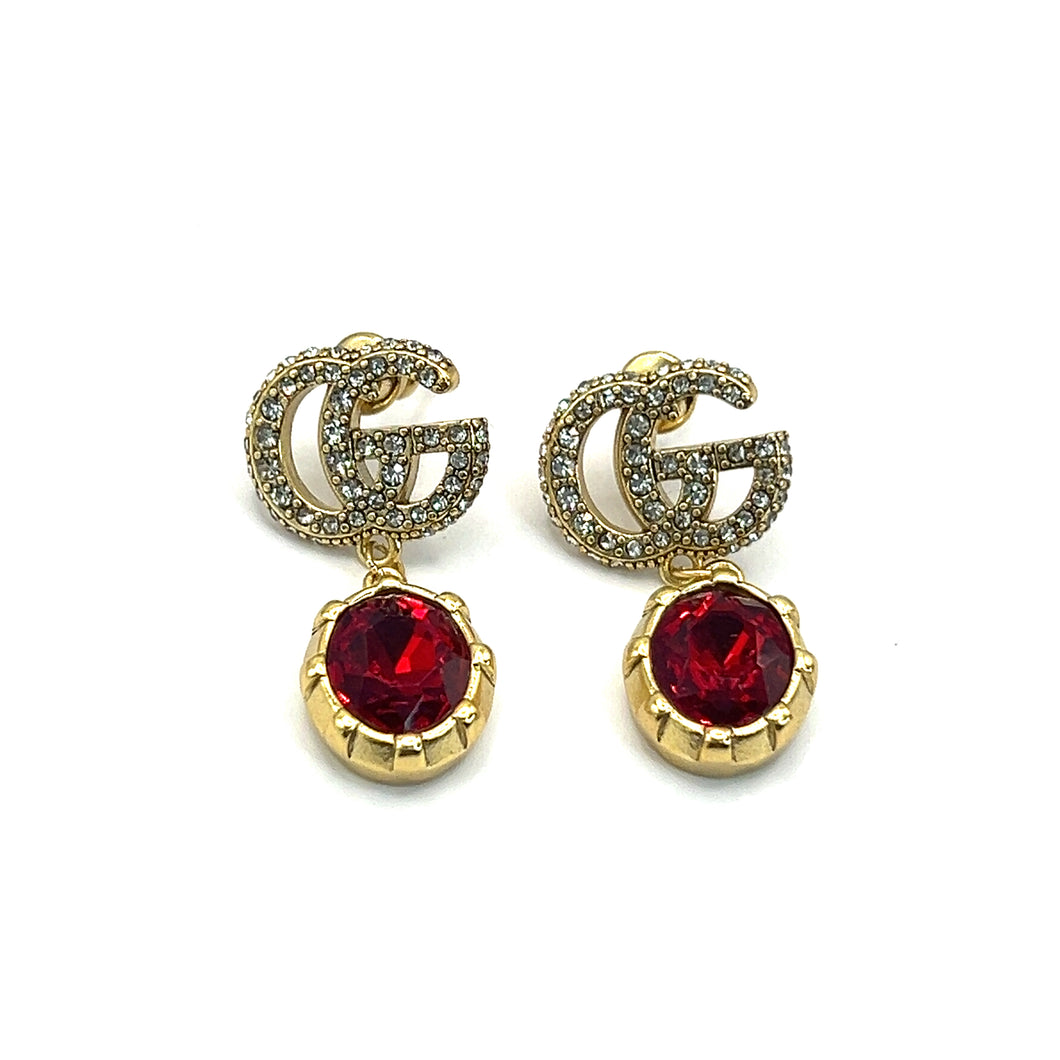 Aretes GG rojos