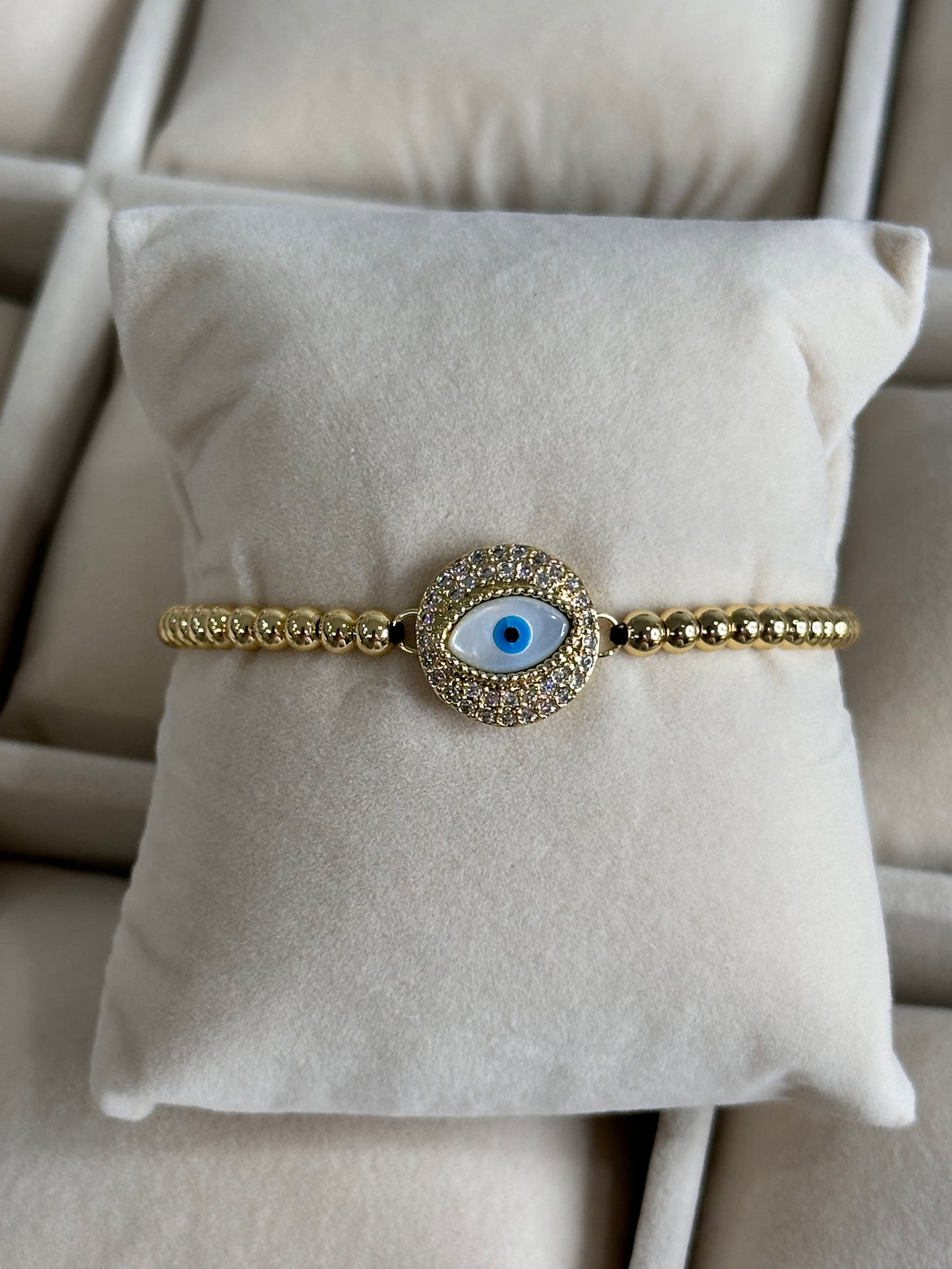 Ajustable brazalete de ojito