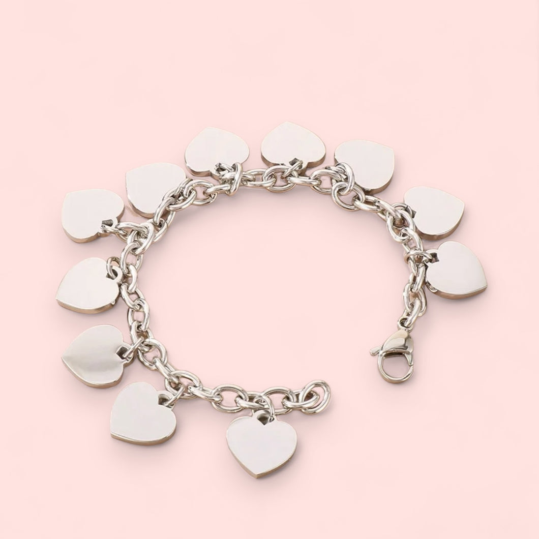 Pulsera de colgantes de corazones